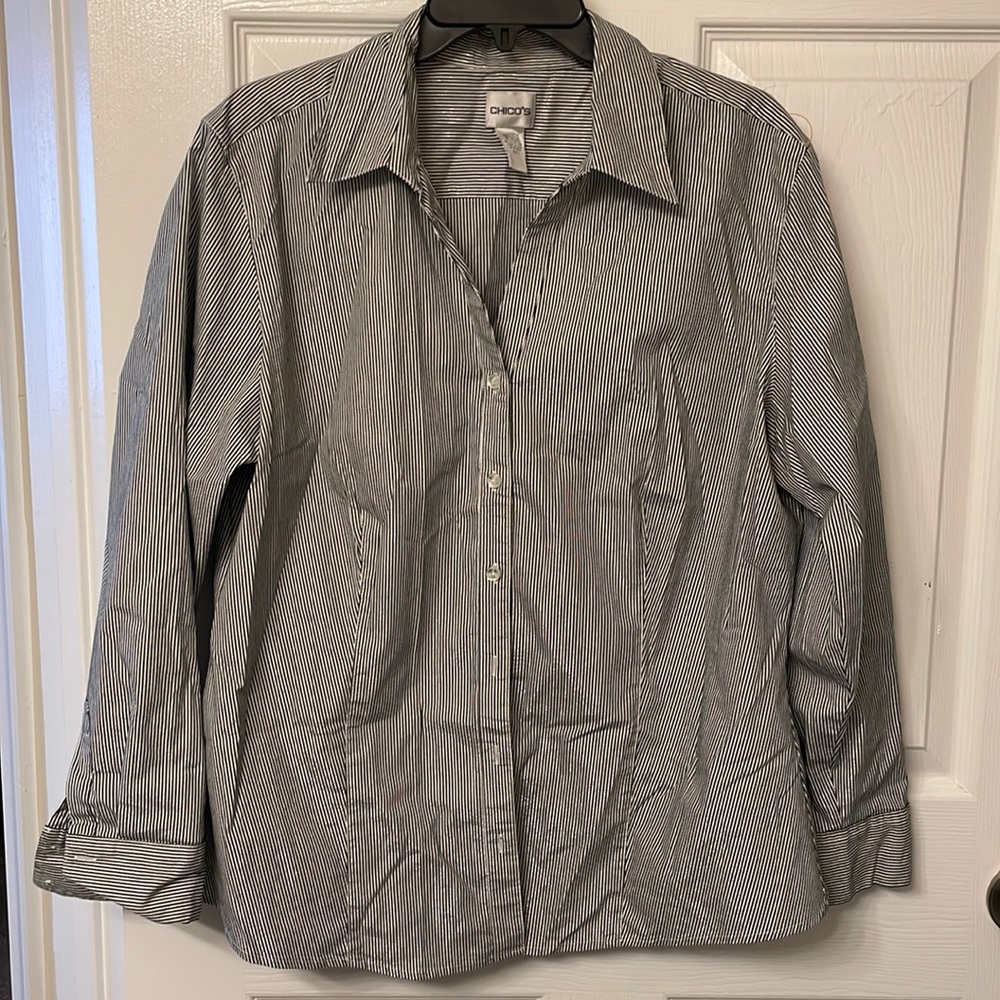 Long sleeved striped shirt.